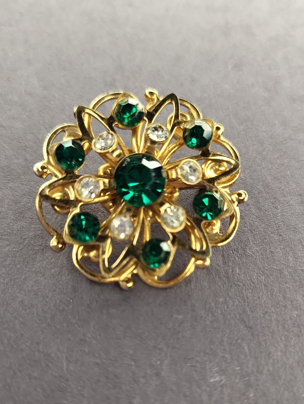 Gold-Tone Floral Brooch with Green and Clear Crystals